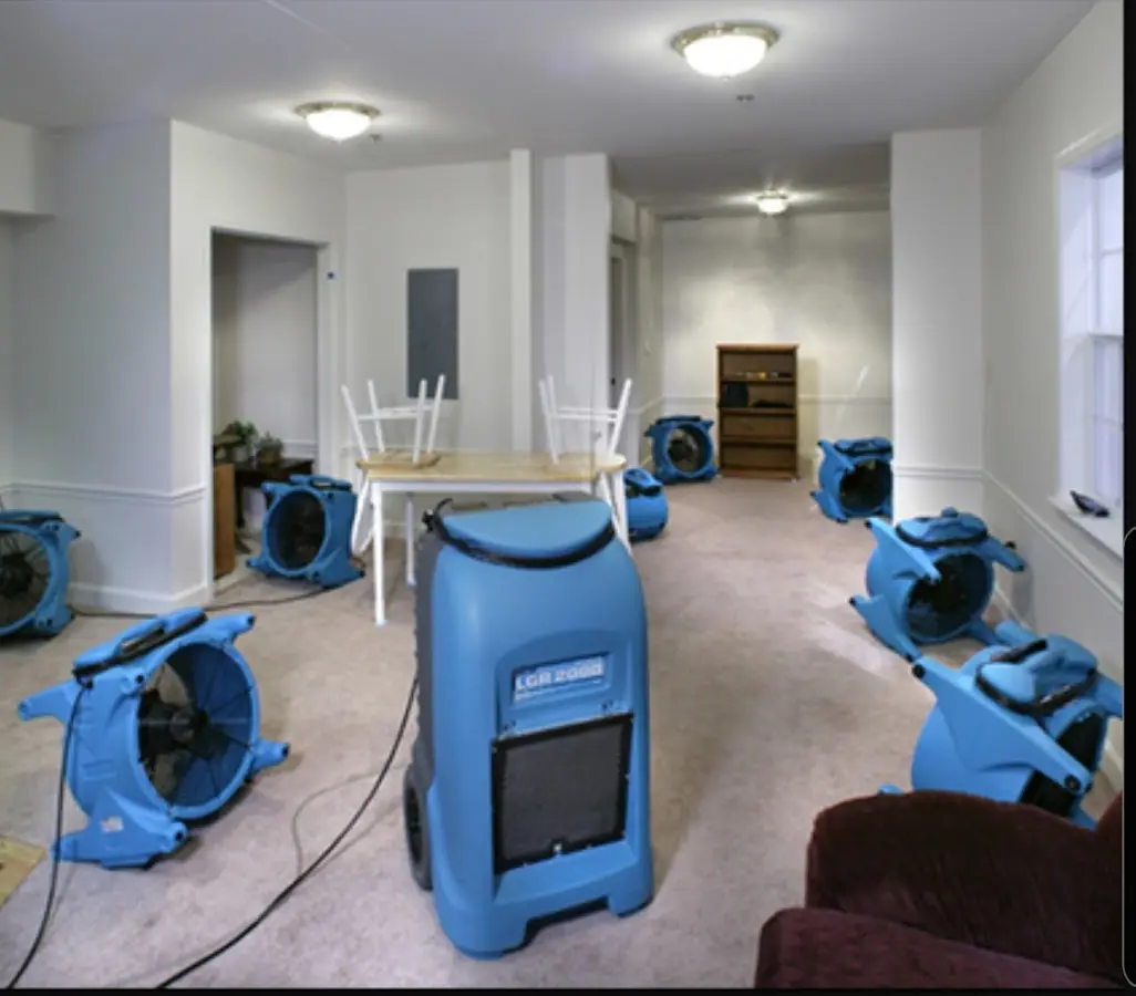 Air movers and dehumidifier setup for Water Damage Restoration in Moundsville